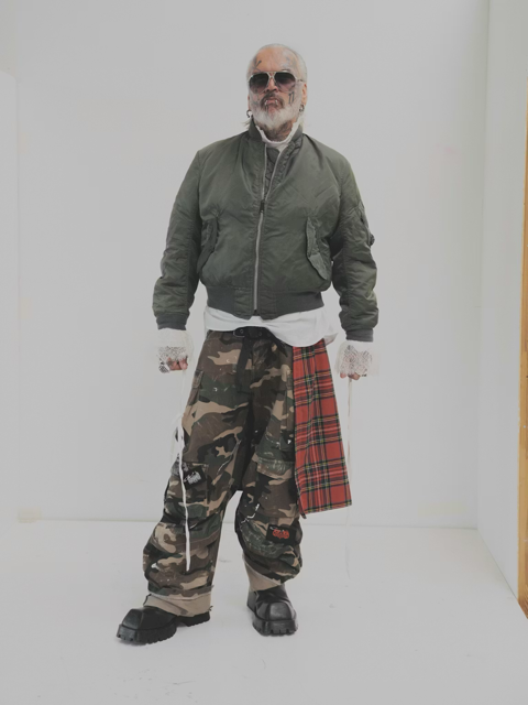 Sven Marquardt in sunglasses and bomber jacket — the face of Berghain's door since 1998